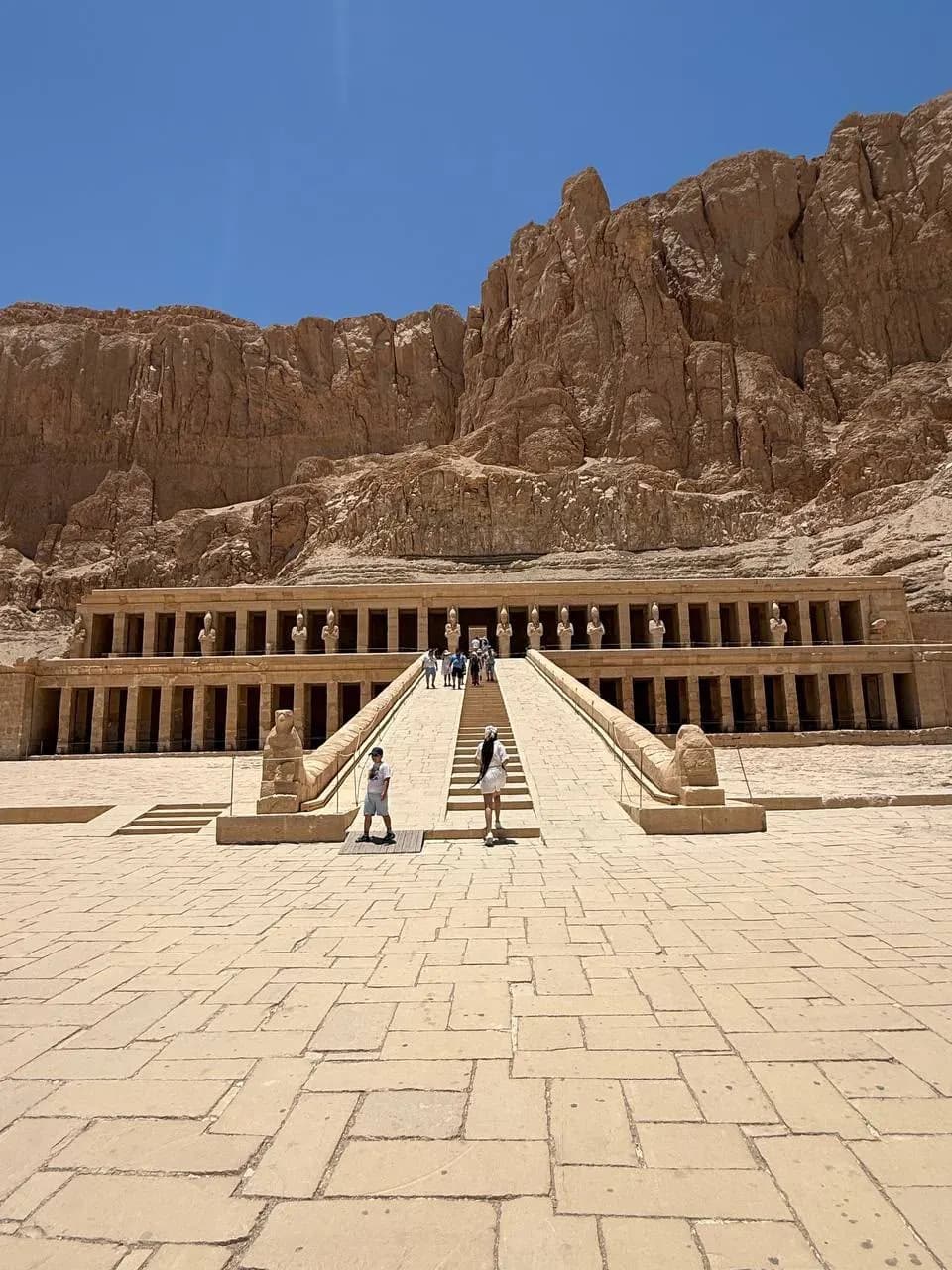 The terraced Temple of Hatshepsut beneath desert cliffs at Deir el-Bahari, Luxor